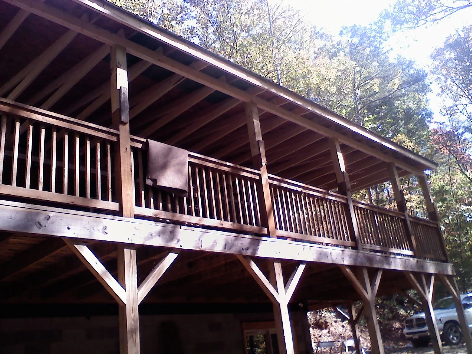 Timber framing under a new elevated porch and deck — Roof Leak Repair in Gerrardstown by Roofing Brothers